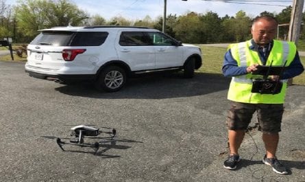 Man preparing to operate a drone