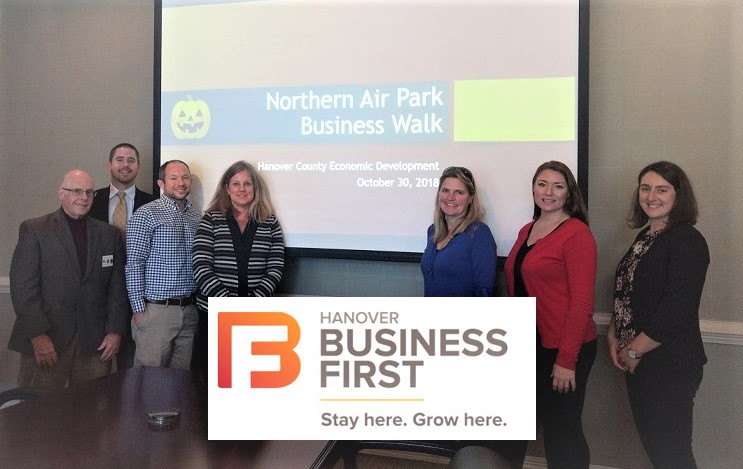 People gathered in a board room at for the Northern Air Park Business Walk