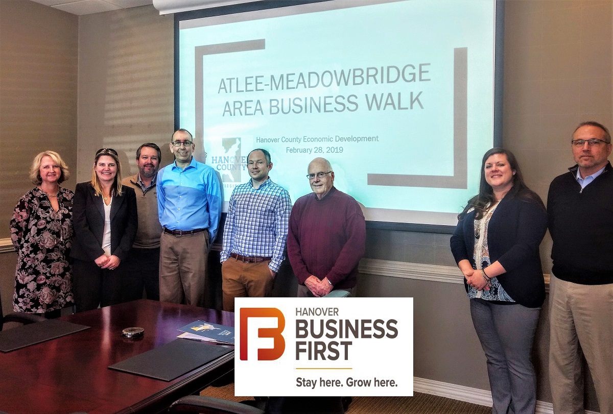 People gathered in a board room for the Atlee-Meadowbridge for the first Business Walk of 2019